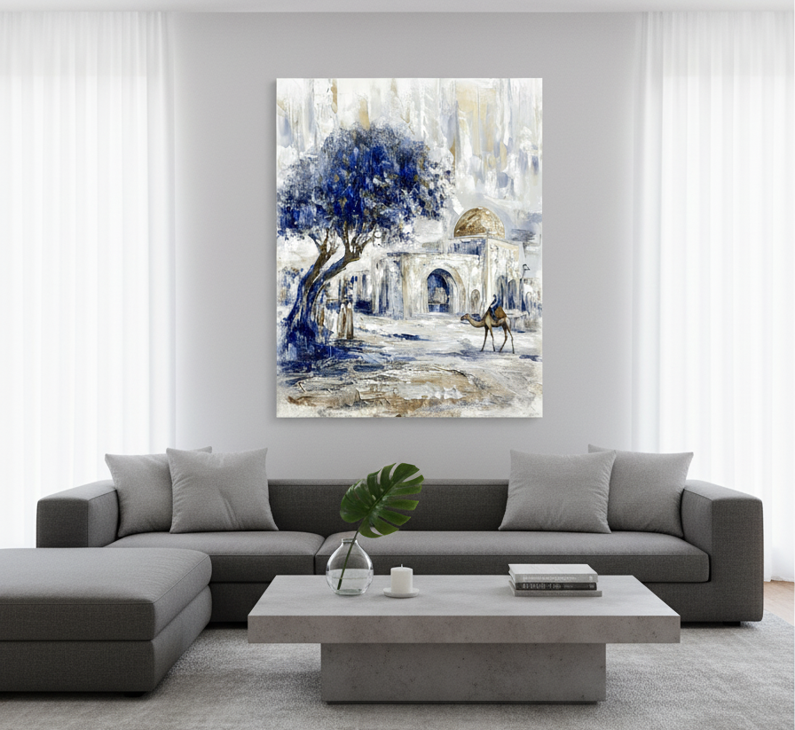 Living room with a large Lehava Art Kever Rochel painting on the wall above a gray sectional sofa.