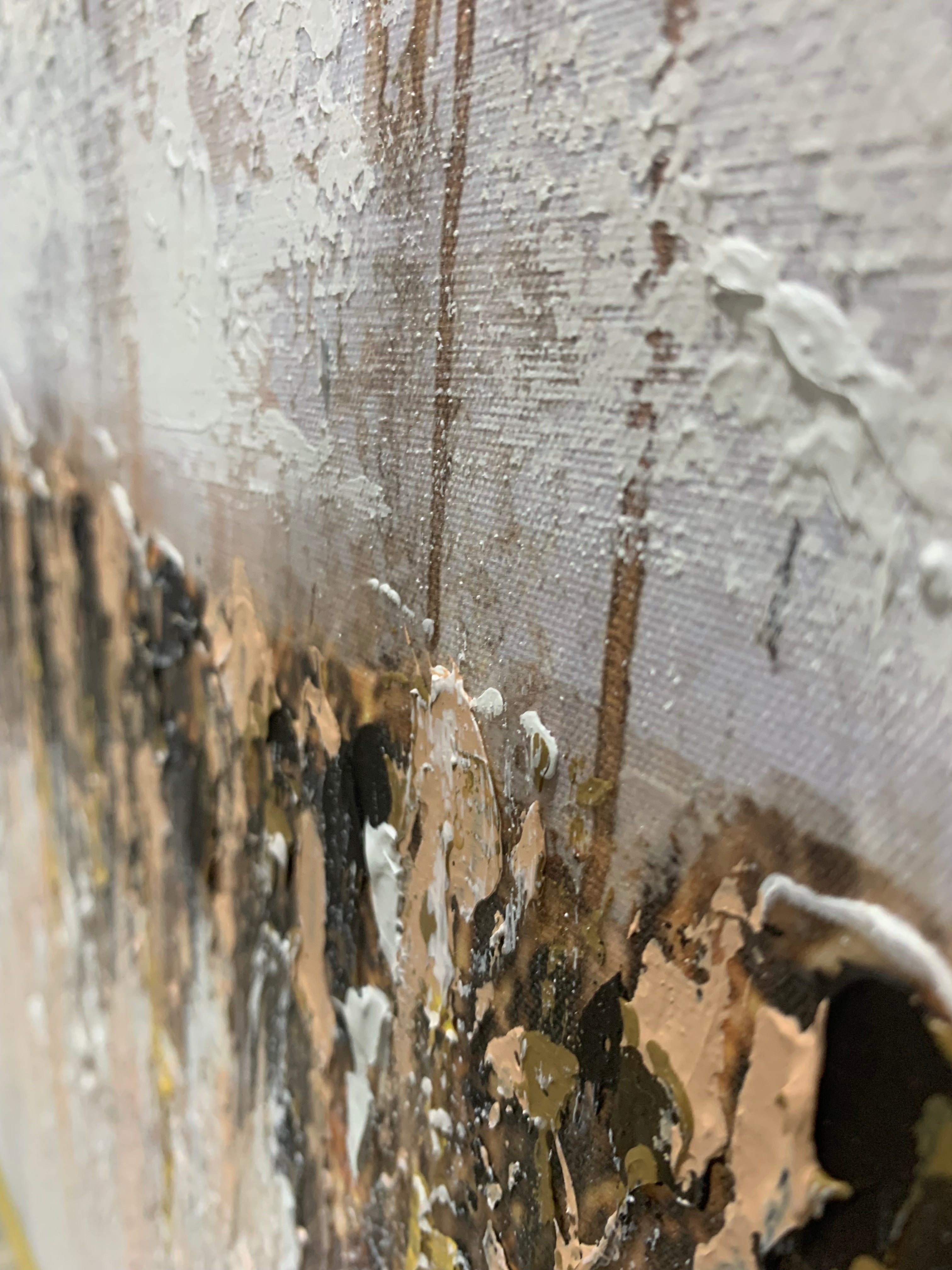 Close-up of Lehava Art Kosel vertical sculpture in ash and gold with ash-peach tones, showcasing intricate artistic details.